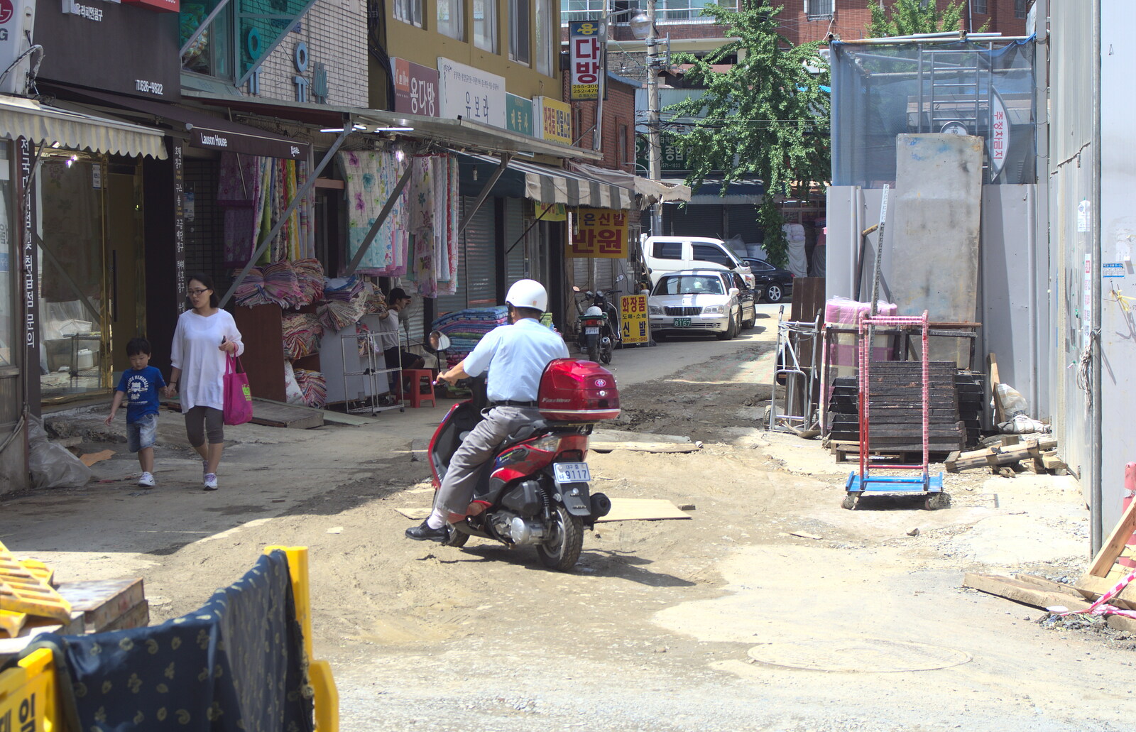 Another moped pootles off from Seomun Market, Daegu, South Korea - 1st July 2012