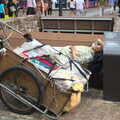 A sleeping homeless dude with his world in a cart, Seomun Market, Daegu, South Korea - 1st July 2012
