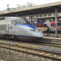 The 16-carriage-long KTX train speeds past , Seomun Market, Daegu, South Korea - 1st July 2012