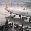 An Asiana Airlines comes on to the stand, Seomun Market, Daegu, South Korea - 1st July 2012
