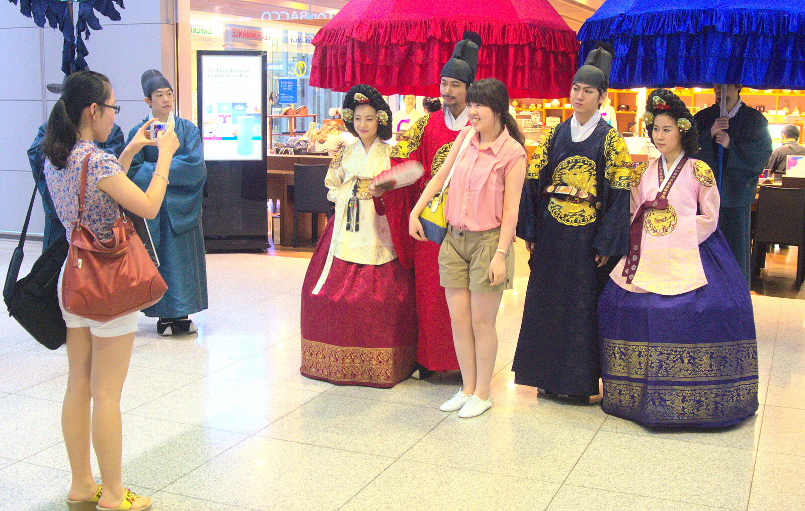 Tourists take photos from Seomun Market, Daegu, South Korea - 1st July 2012
