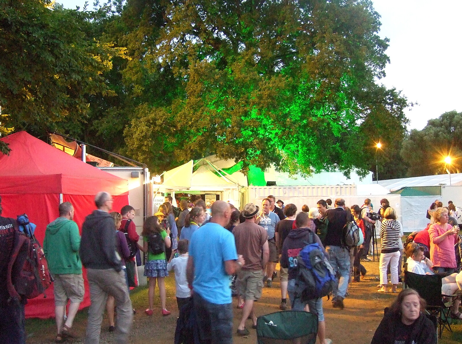 Some trees are lit up with green light from The Cambridge Folk Festival, Cherry Hinton, Cambridge - 28th July 2012