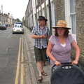 Isobel pushes the buggy as James follows, The Cambridge Folk Festival, Cherry Hinton, Cambridge - 28th July 2012