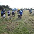 The riders head off across the grass, The RSPB Charity Bike Ride, Little Glemham, Suffolk - 5th August 2012
