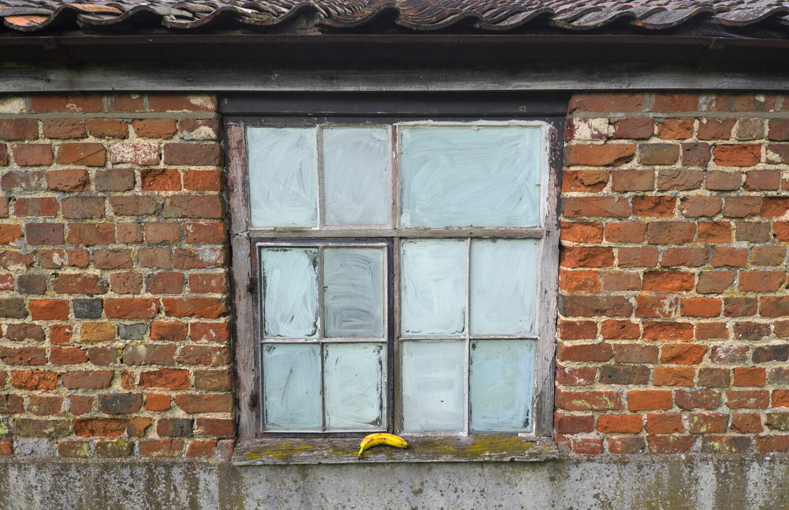 An out-house window with an abandoned banana from The RSPB Charity Bike Ride, Little Glemham, Suffolk - 5th August 2012