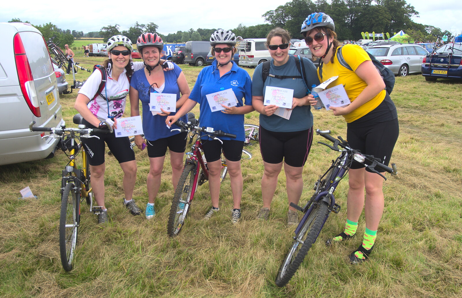 The riders return and show off their certificates from The RSPB Charity Bike Ride, Little Glemham, Suffolk - 5th August 2012
