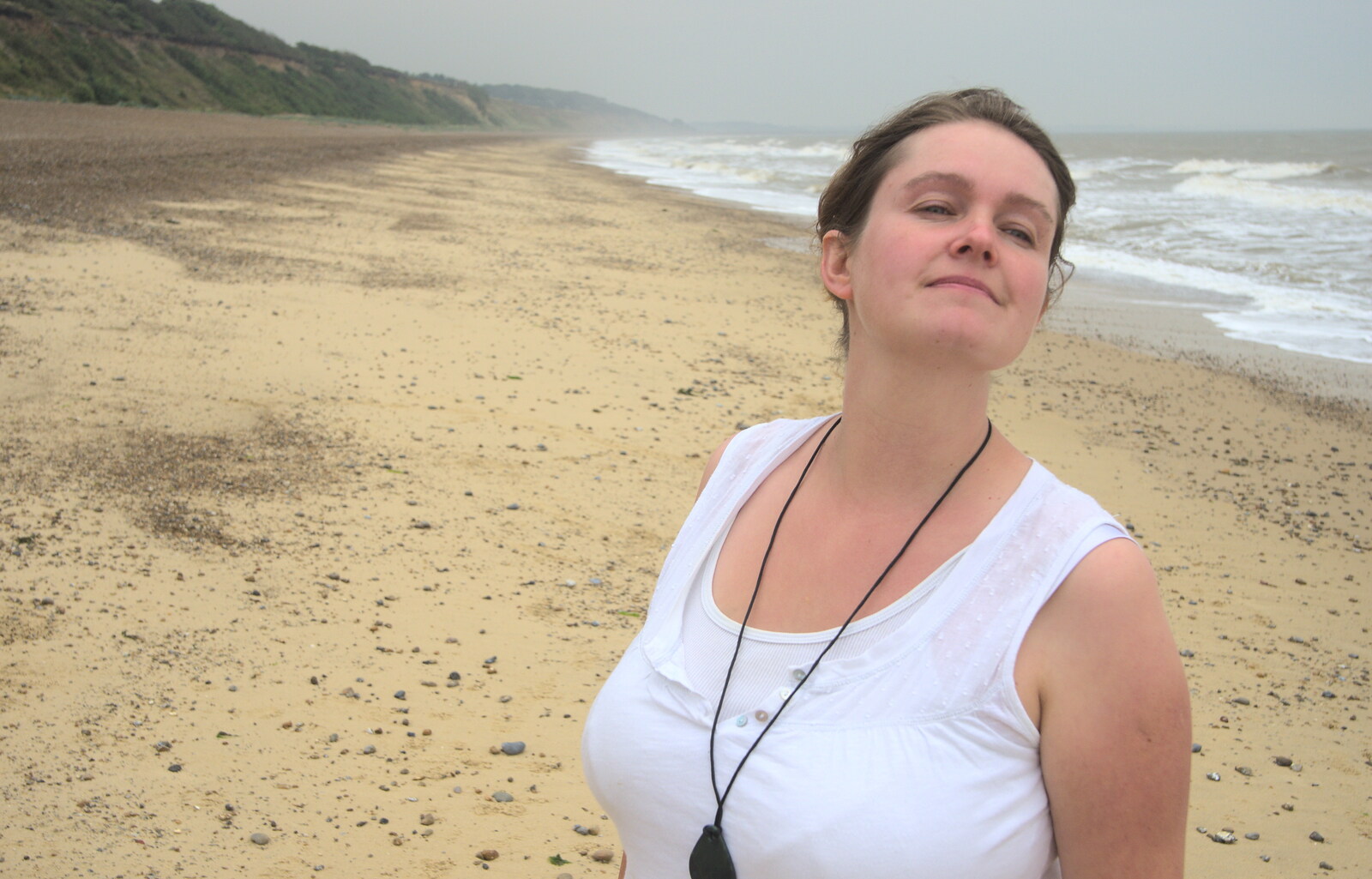 Isobel looks down the beach from Camping by the Seaside, Cliff House, Dunwich, Suffolk - 15th August 2012