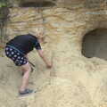 Fred inspects a hole in the cliff, Camping by the Seaside, Cliff House, Dunwich, Suffolk - 15th August 2012