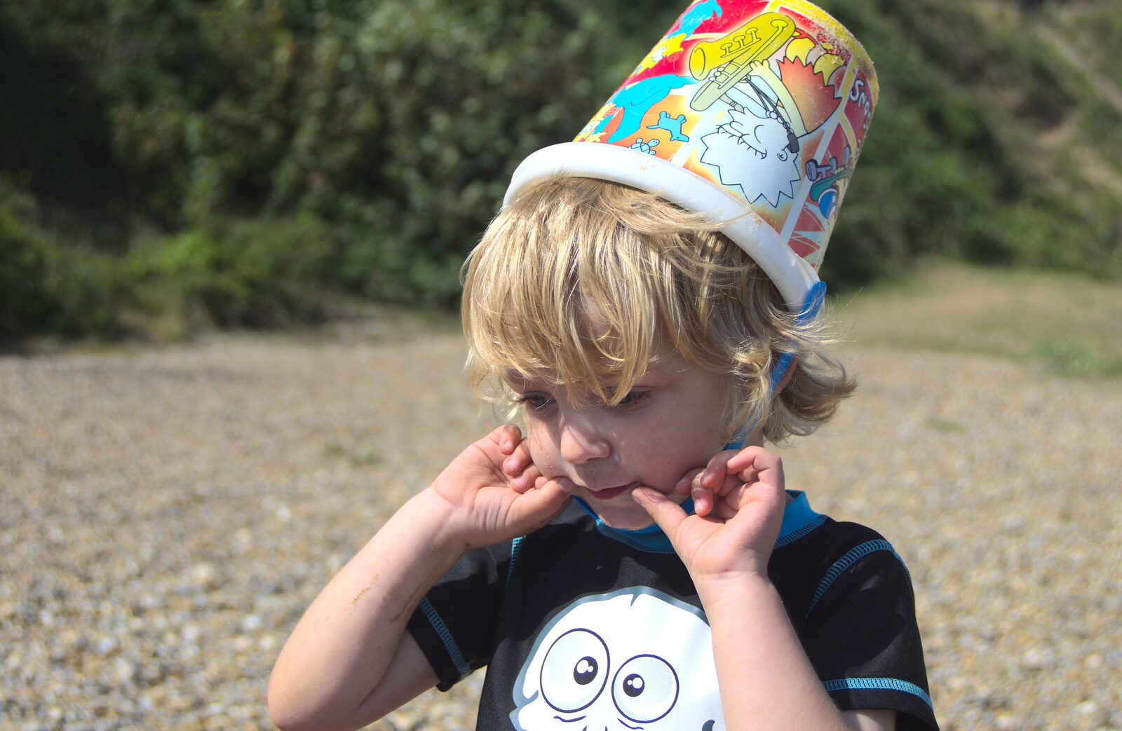 Fred with a bucket on his head from Camping by the Seaside, Cliff House, Dunwich, Suffolk - 15th August 2012