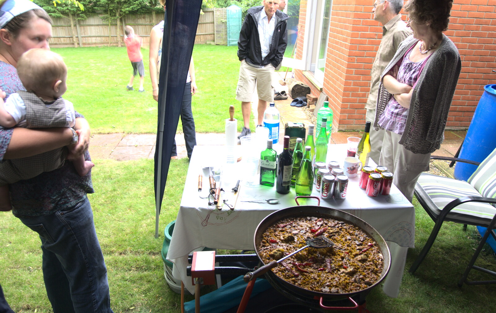 Isobel scopes out the paella from Bill and Carmen's Paella Barbeque, and a Trip to the City, Yaxley and Norwich - 25th August 2012