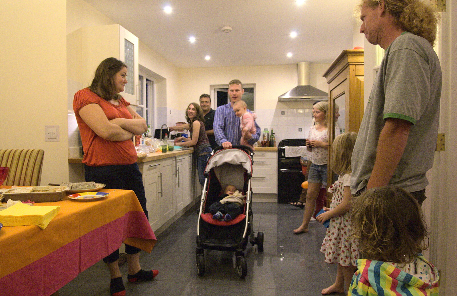 Mikey P with sprogs in the kitchen from Bill and Carmen's Paella Barbeque, and a Trip to the City, Yaxley and Norwich - 25th August 2012
