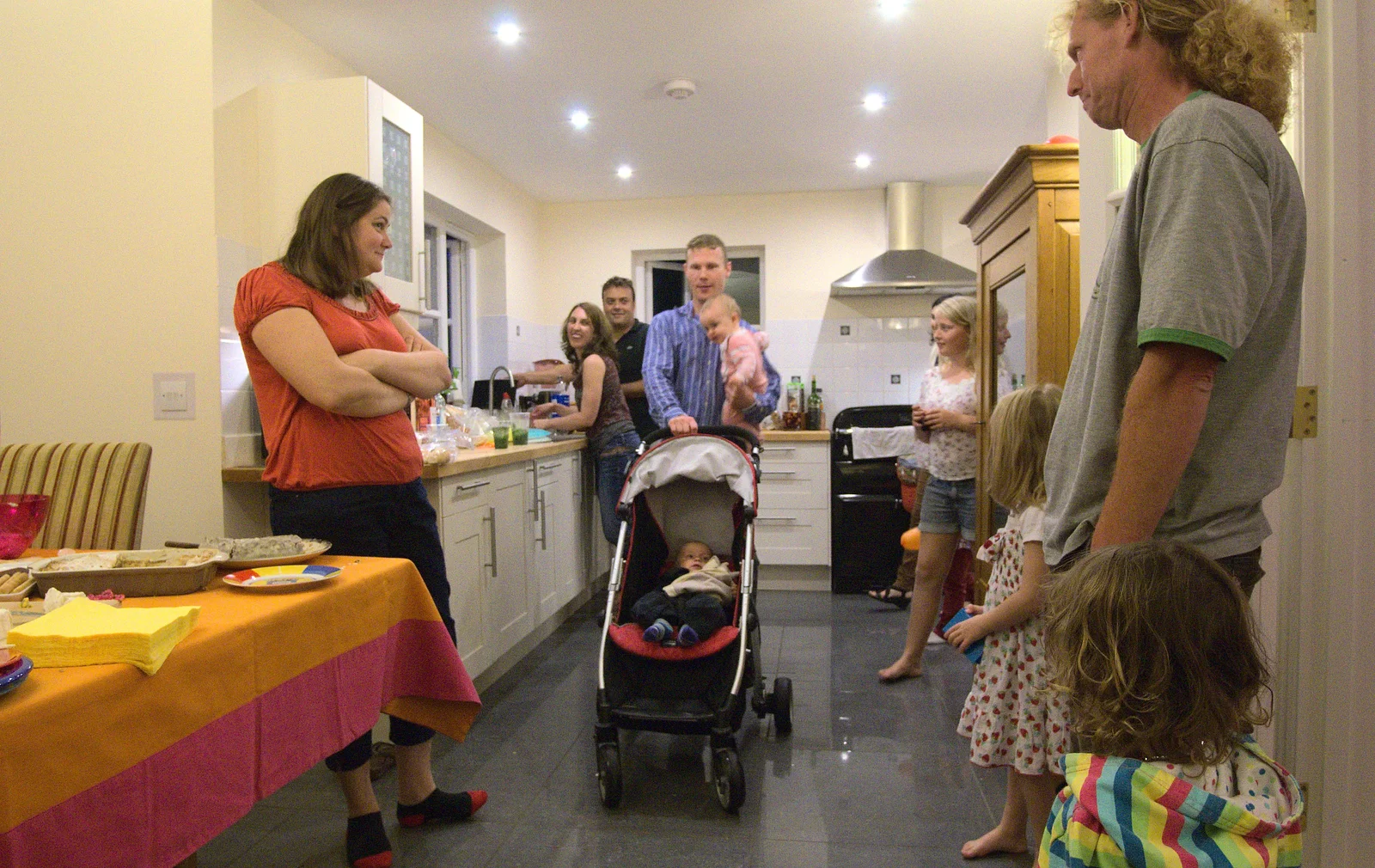 Mikey P with sprogs in the kitchen, from Bill and Carmen's Paella Barbeque, and a Trip to the City, Yaxley and Norwich - 25th August 2012