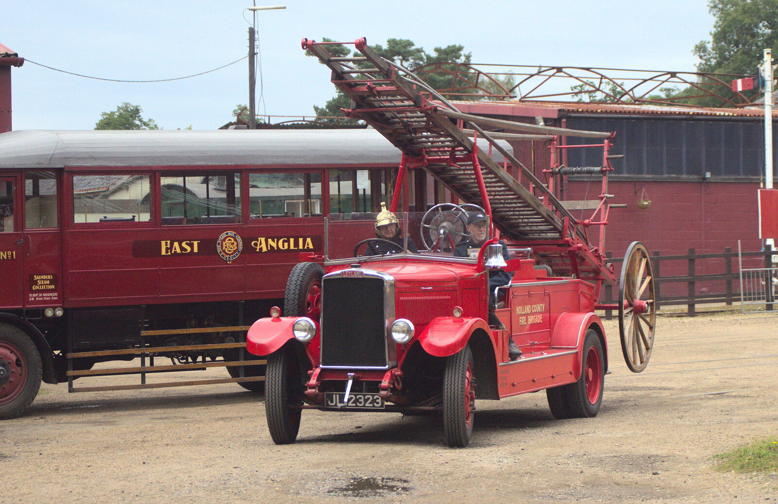 An old fire engine trundles past a steam bus from A Bressingham Steam Day, Norfolk, 27th August 2012