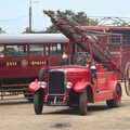 An old fire engine trundles past a steam bus, A Bressingham Steam Day, Norfolk, 27th August 2012