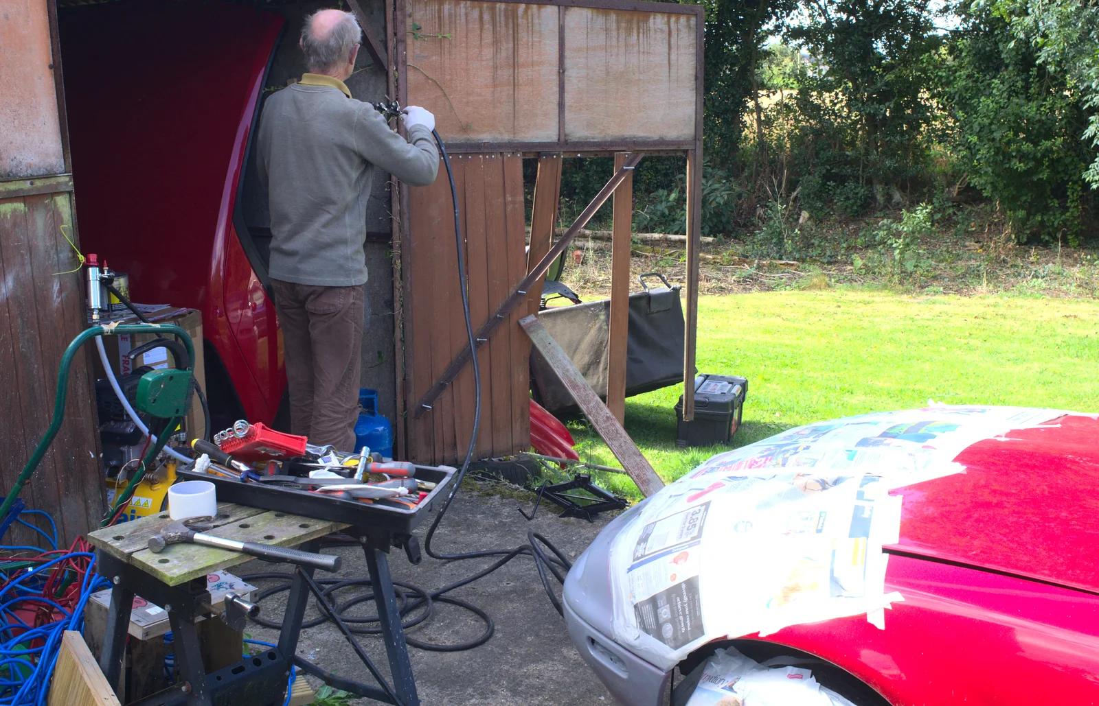 Graham prepares to spray the MX-5, from Camping at Dower House, West Harling, Norfolk - 1st September 2012