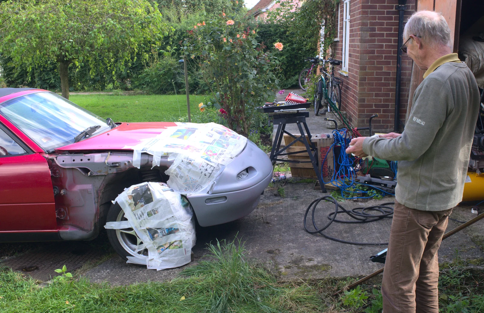 The front of the Mazda gets an undercoat, from Camping at Dower House, West Harling, Norfolk - 1st September 2012