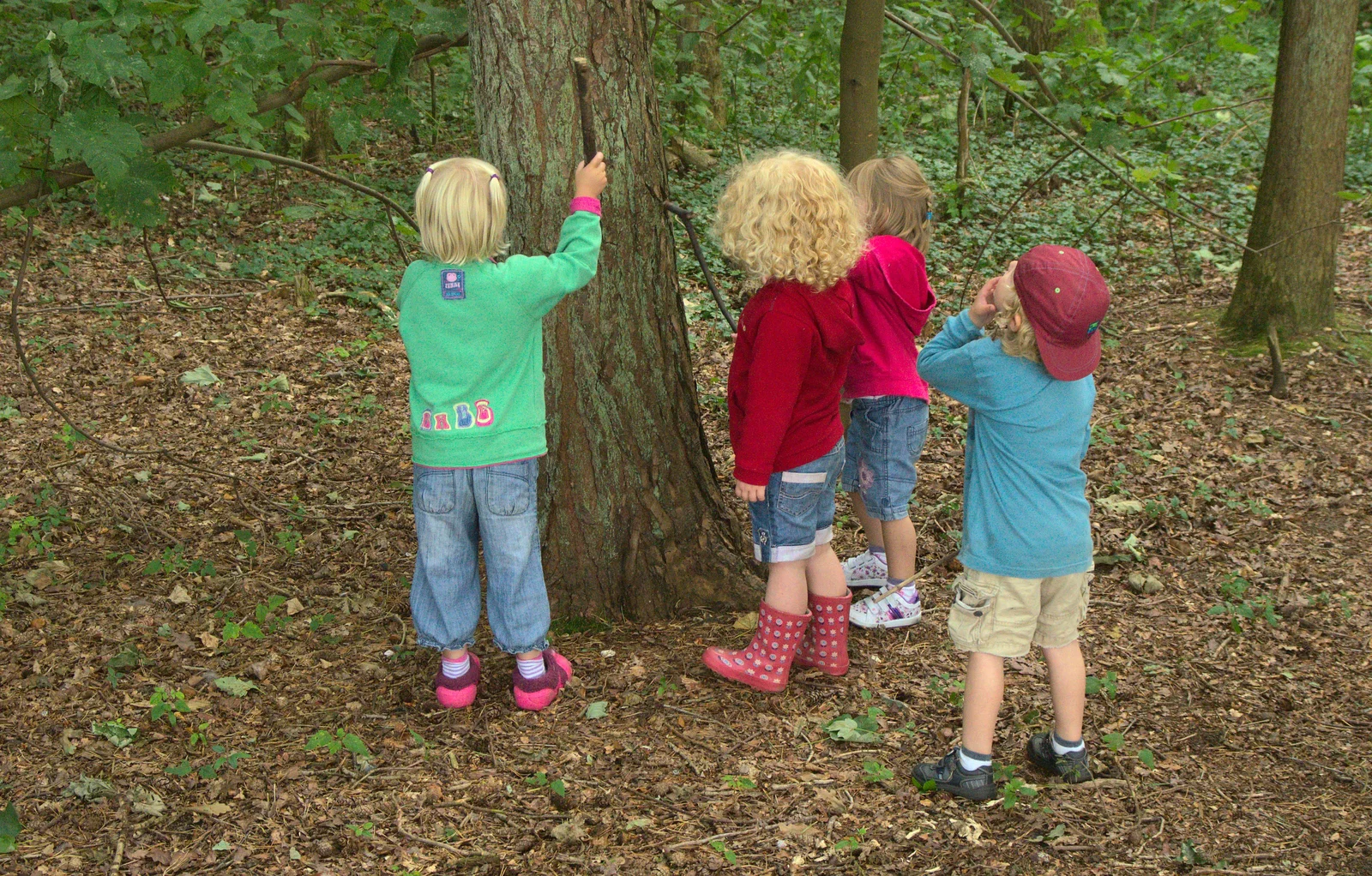 The gang whack a tree, from Camping at Dower House, West Harling, Norfolk - 1st September 2012