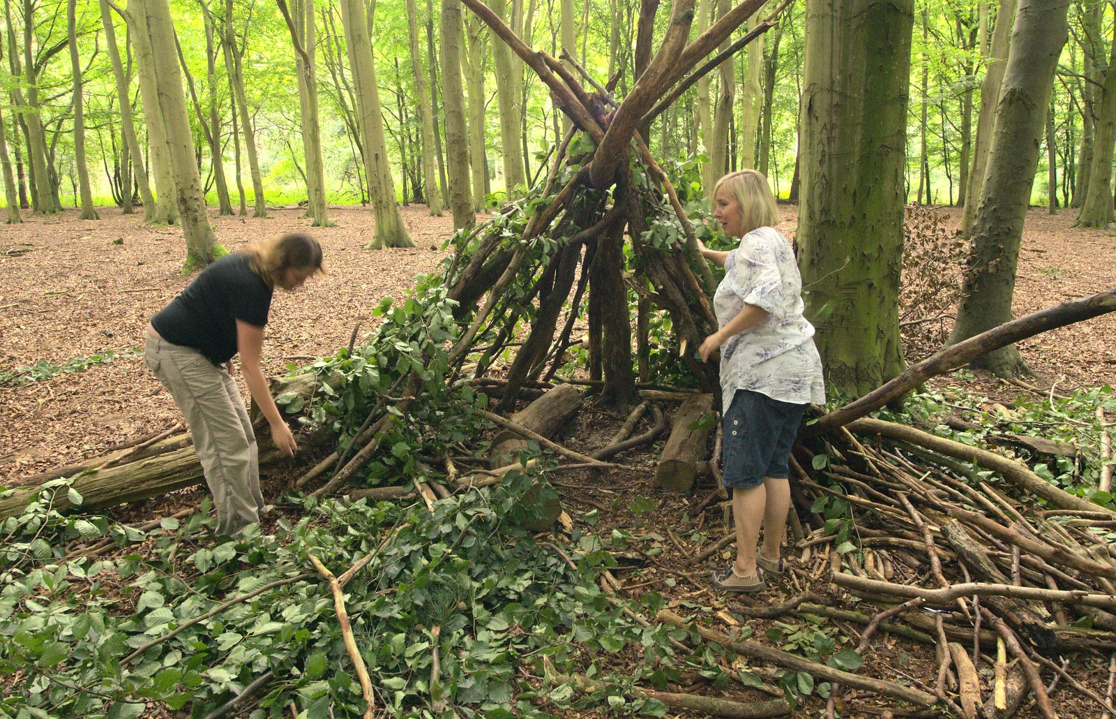 Isobel and Rachel do some den re-working, from Camping at Dower House, West Harling, Norfolk - 1st September 2012