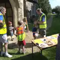 Hannah is on biscuit duty outside All-Saints, Stuston, The BSCC does Matthew's Church Bike Ride, Suffolk - 8th September 2012