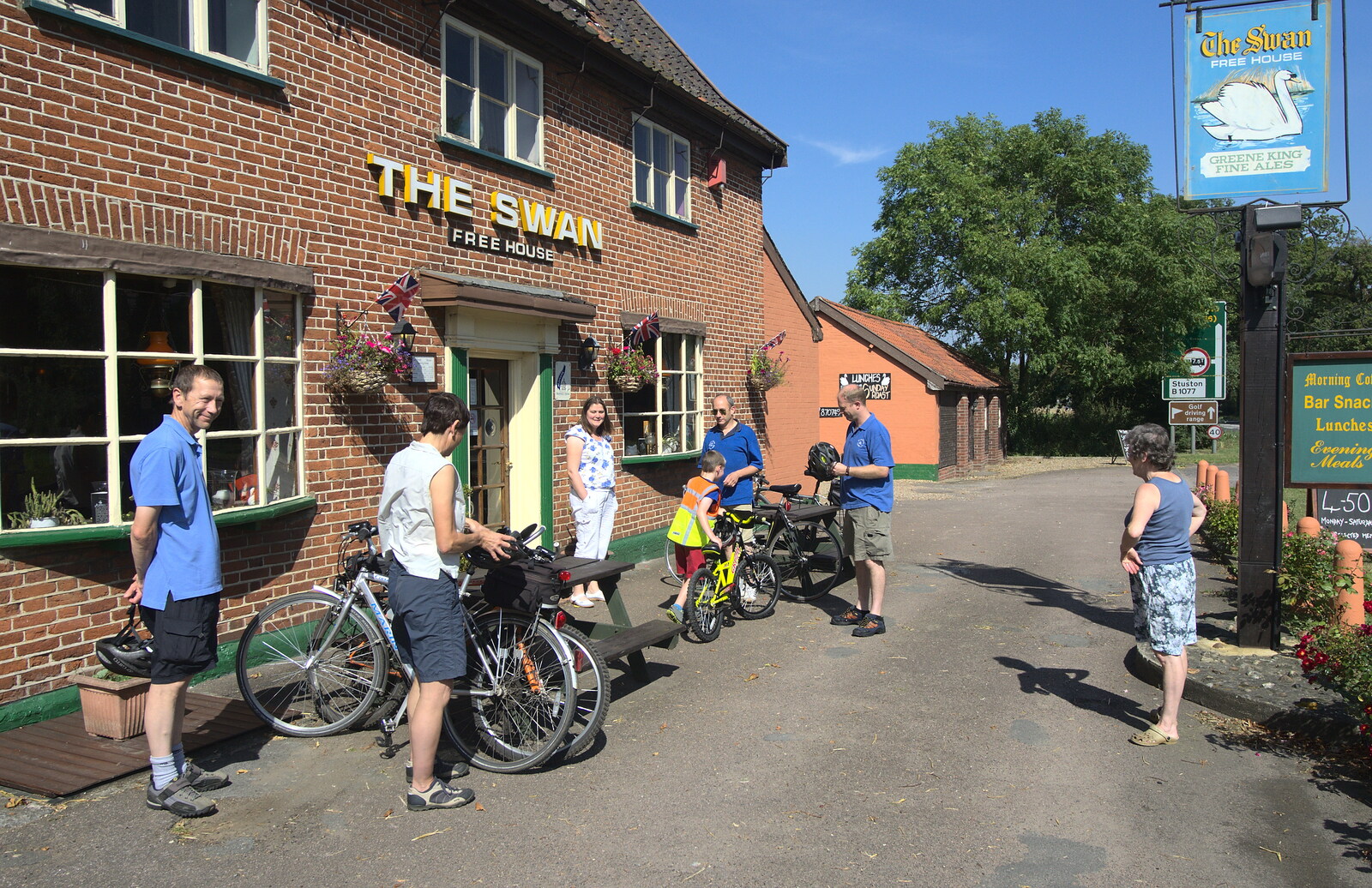The cyclists return to The Swan from The BSCC does Matthew's Church Bike Ride, Suffolk - 8th September 2012