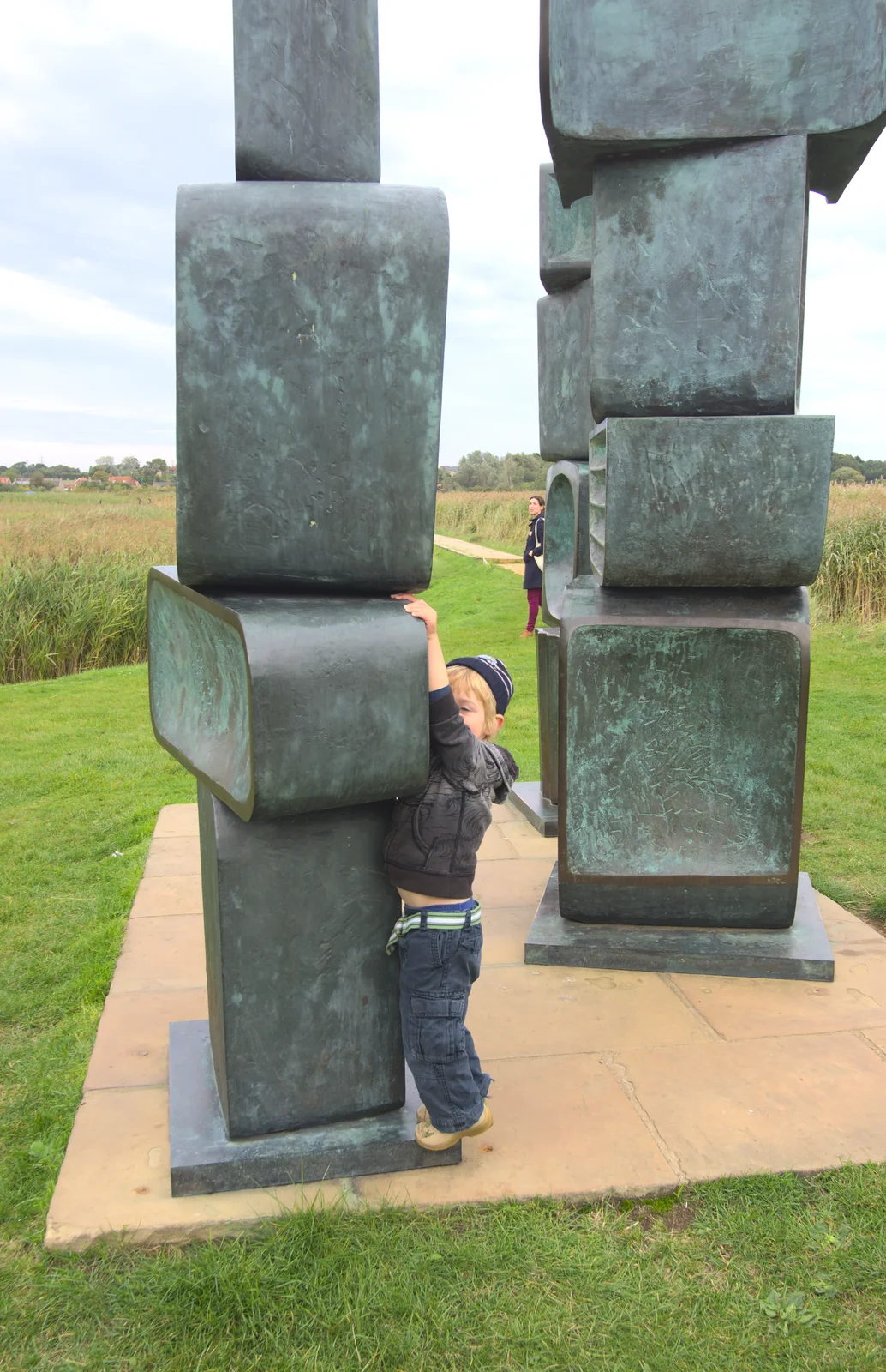 Fred climbs up on a Barbara Hepworth sculpture, from The Aldeburgh Food Festival, Aldeburgh, Suffolk - 30th September 2012