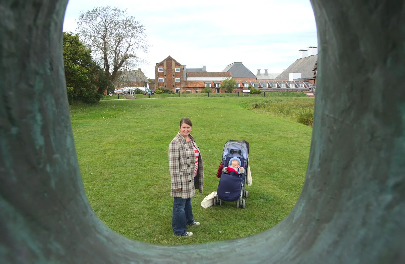 Isobel and Harry, seen through the sculpture of 'Man', from The Aldeburgh Food Festival, Aldeburgh, Suffolk - 30th September 2012