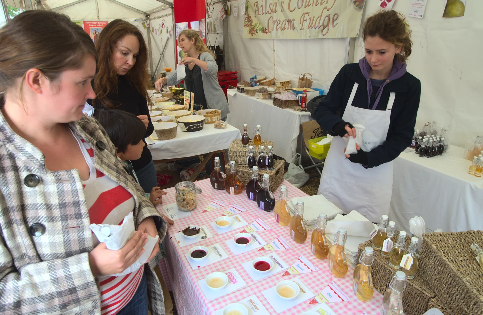 Isobel tries out some flavoured vinegars, from The Aldeburgh Food Festival, Aldeburgh, Suffolk - 30th September 2012