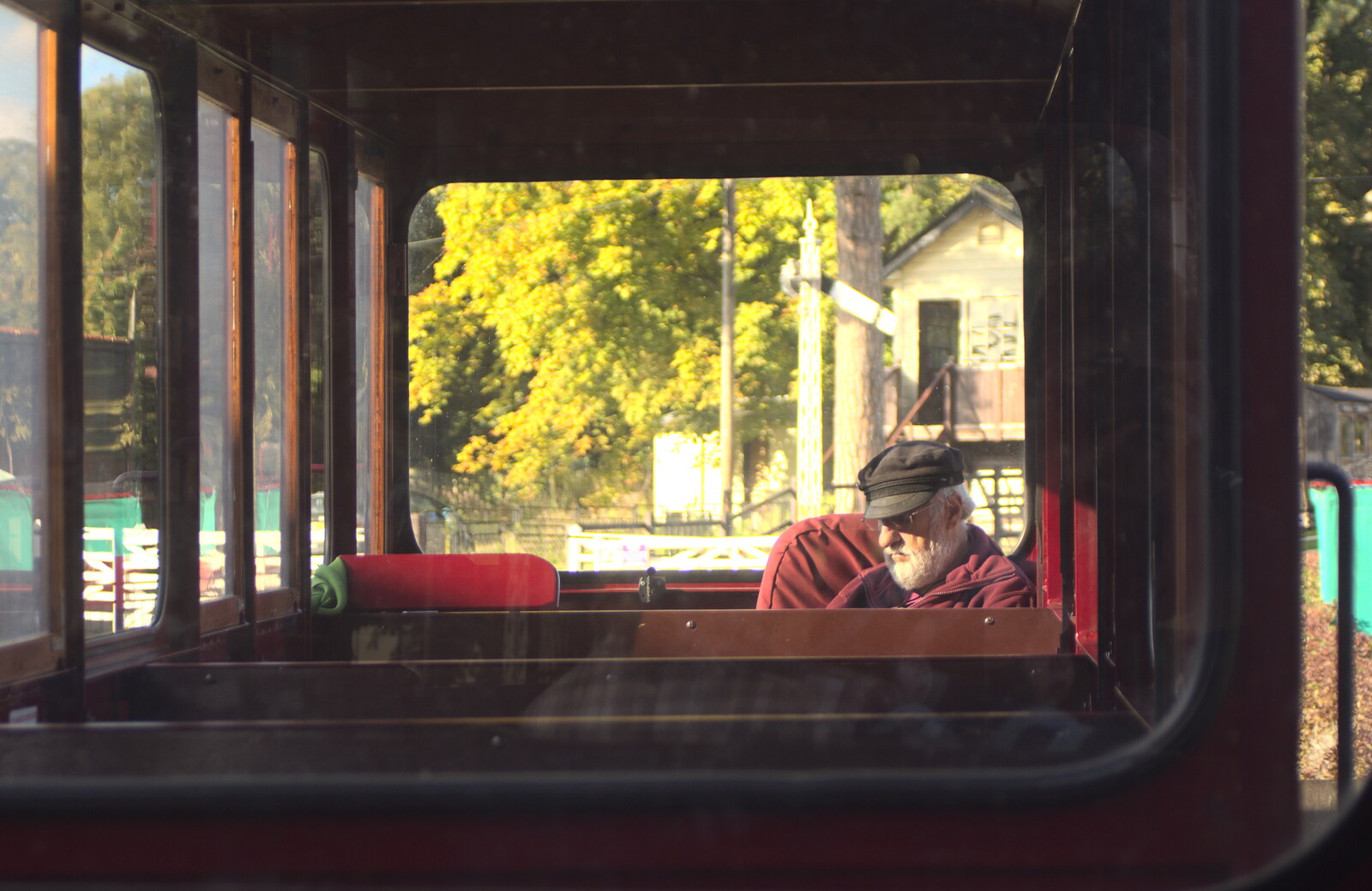 The conductor waits at the back of the train from Alan Bloom's Gardens, Bressingham, Norfolk - 6th October 2012