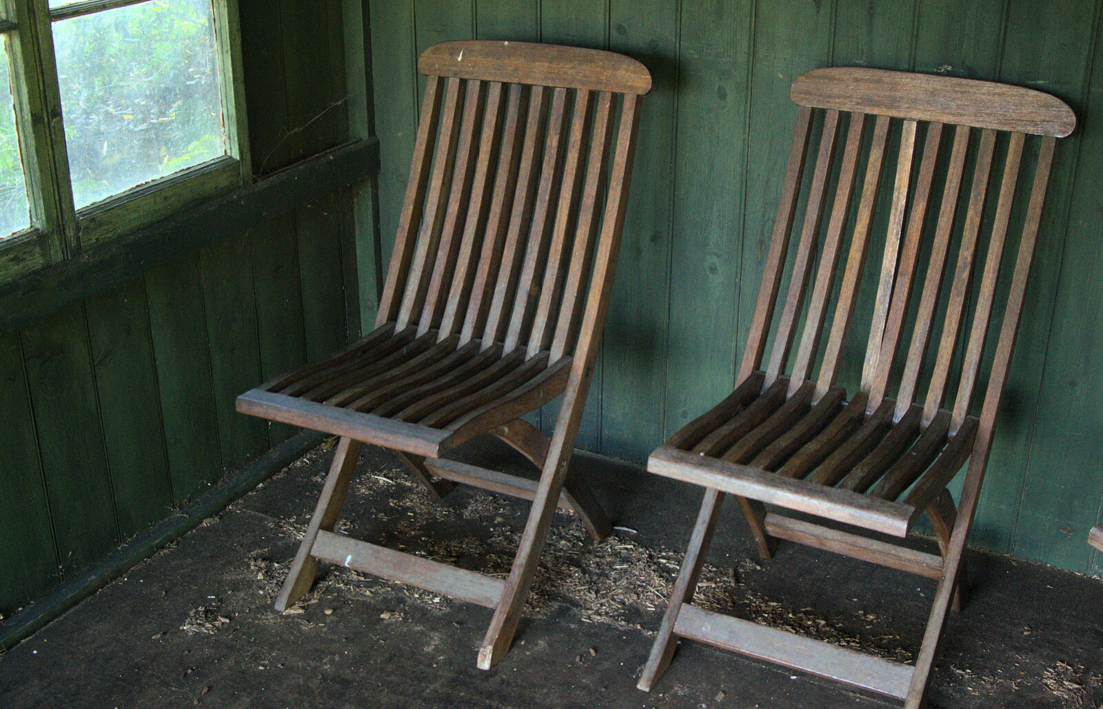 A pair of teak garden chairs in a shed from Alan Bloom's Gardens, Bressingham, Norfolk - 6th October 2012