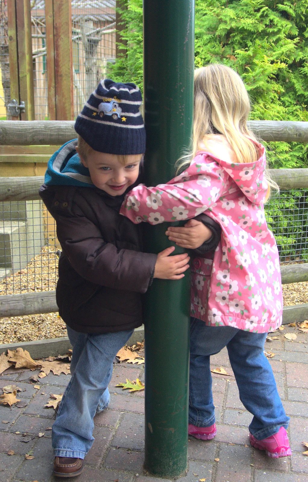 Fred and Anna spin round a pole, from An Appley Sort of Zoo Day, Carleton Rode and Banham, Norfolk - 14th October 2012