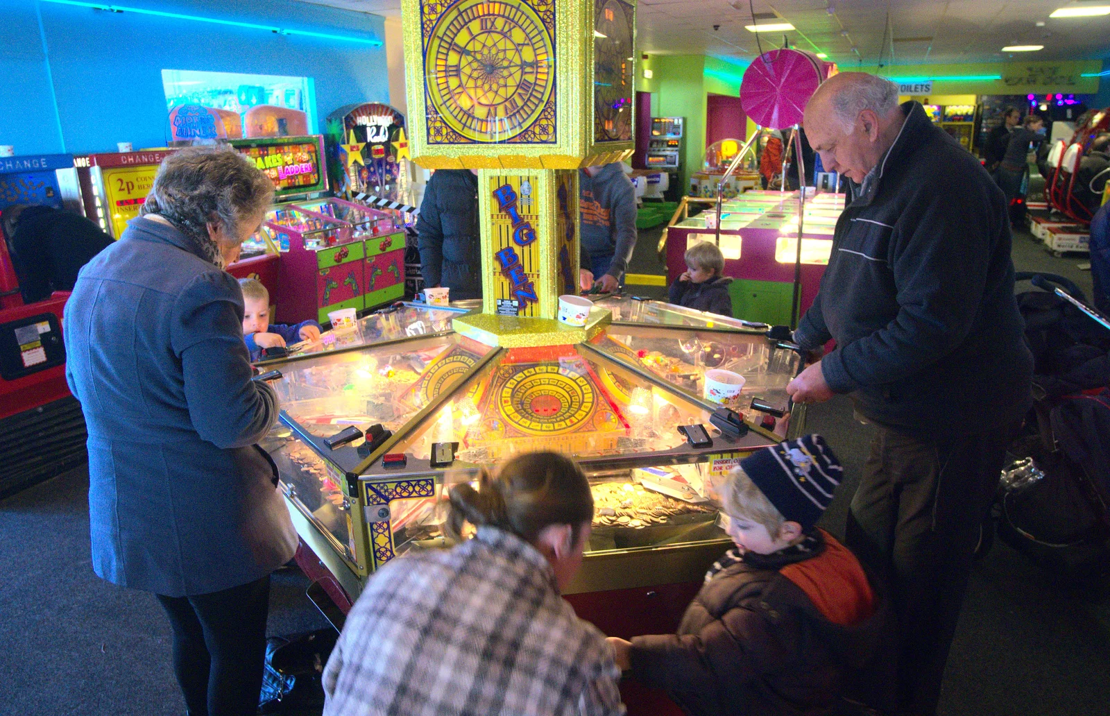 Isobel and Fred do the coin push, from A Busy Day, Southwold and Thornham, Suffolk - 11th November 2012