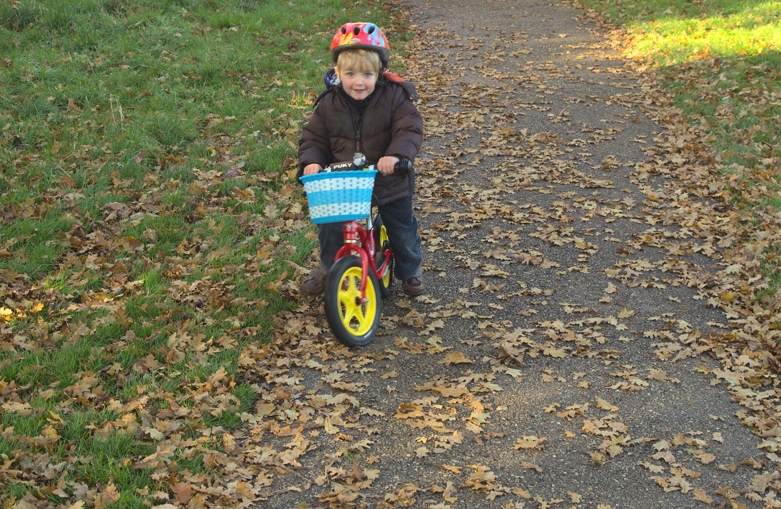 Over in Thornham, Fred's on his balance bike from A Busy Day, Southwold and Thornham, Suffolk - 11th November 2012