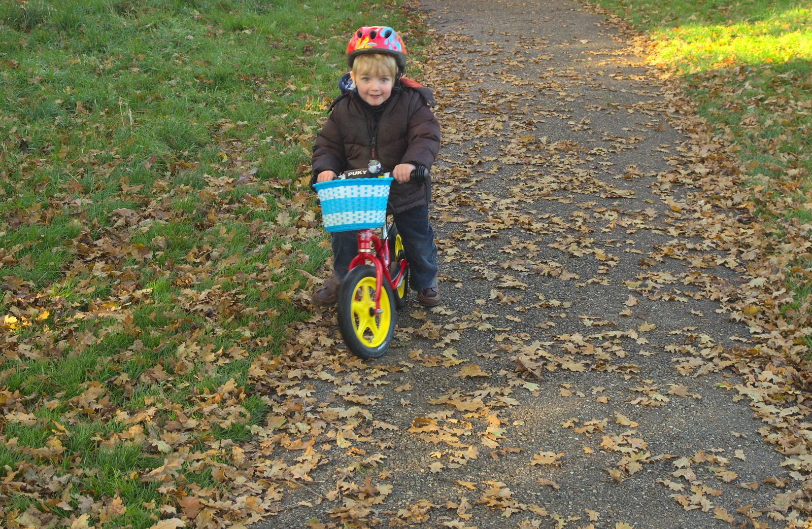 Over in Thornham, Fred's on his balance bike, from A Busy Day, Southwold and Thornham, Suffolk - 11th November 2012