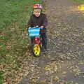 Over in Thornham, Fred's on his balance bike, A Busy Day, Southwold and Thornham, Suffolk - 11th November 2012