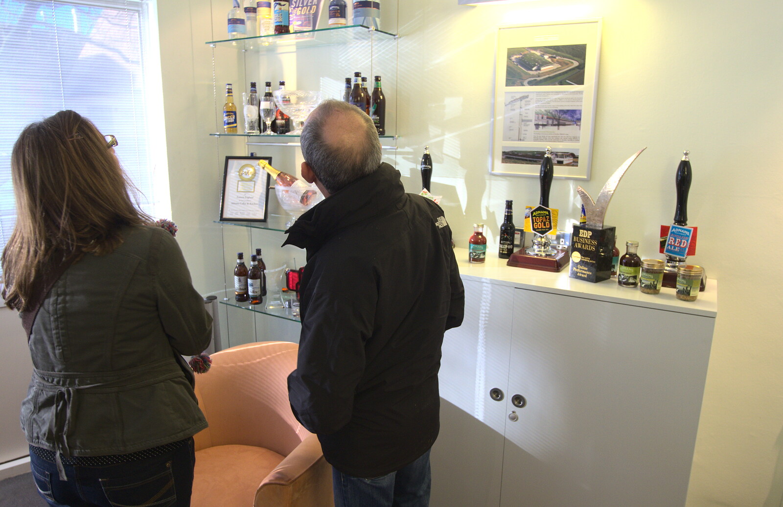 Suey and DH look at beer memorabilia from Apple's Adnams Brewery Birthday Tour, Southwold, Suffolk - 29th November 2012