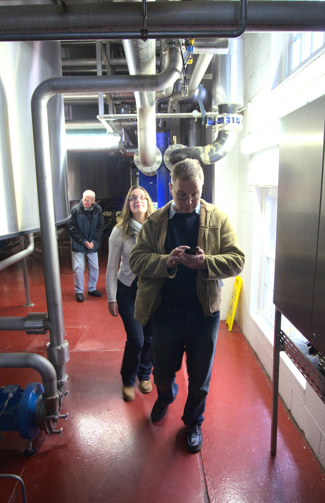 Marc checks for any text action from Apple's Adnams Brewery Birthday Tour, Southwold, Suffolk - 29th November 2012