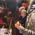 Isobel inspects the orange curiosity, Fred's Nursery Nativity, Palgrave, Suffolk - 13th December 2012