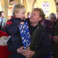 Oak gets a Santa present, Fred's Nursery Nativity, Palgrave, Suffolk - 13th December 2012