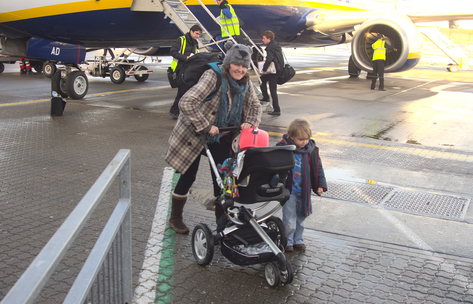 Isobel and The Boys exit the plane from A Pre-Christmas Dinner, Monkstown, Dublin - 16th December 2012