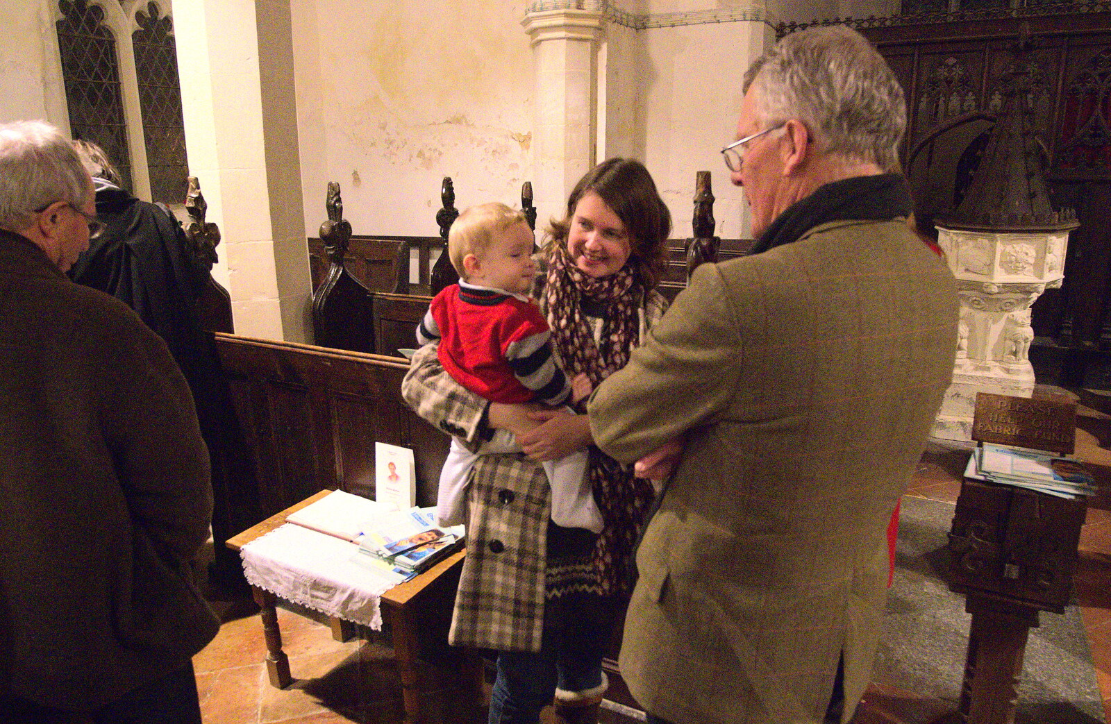 Isobel holds Harry as she chats from The Thrandeston Carol Gig, St. Margaret of Antioch, Thrandeston, Suffolk - 18th December 2012