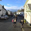 Isobel and Fred walk back through Spreyton, A Trip to Spreyton, Devon - 24th December 2012