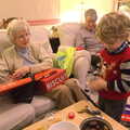 Grandmother gets some biscuits, Christmas Day in Spreyton, Devon - 25th December 2012