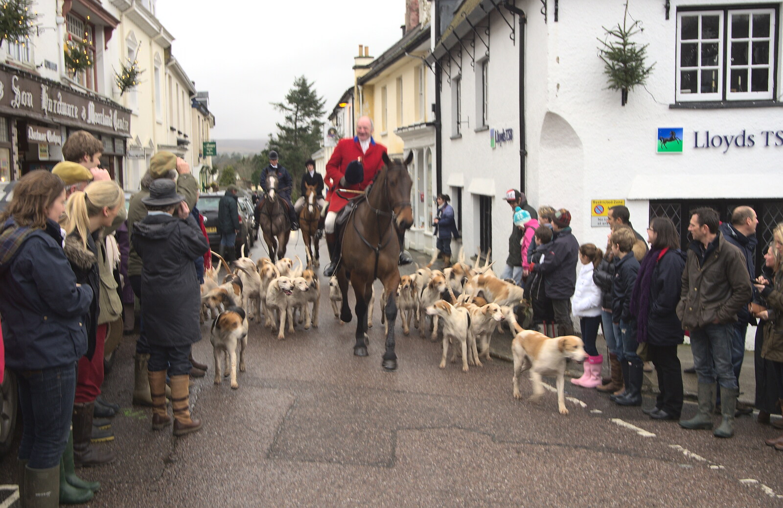 The hounds ride in from Mill Street from The Boxing Day Hunt, Chagford, Devon - 26th December 2012