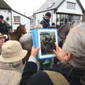 A woman looks absurd using a pooPad to take a pic, The Boxing Day Hunt, Chagford, Devon - 26th December 2012