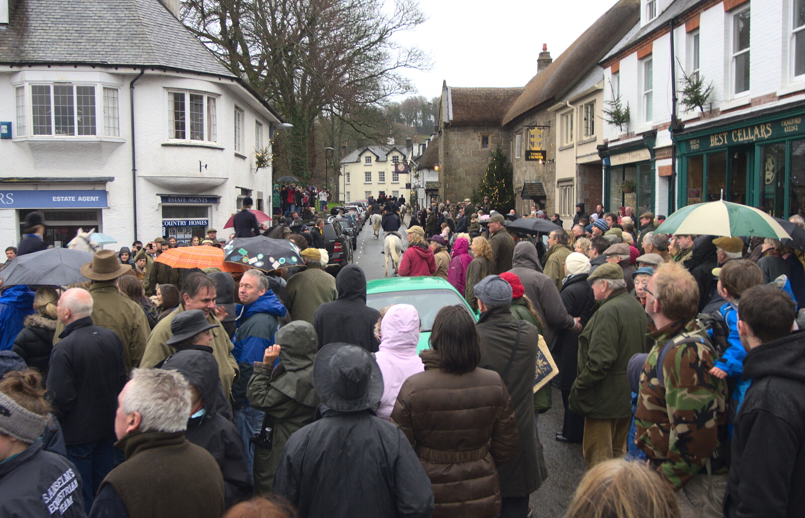 The car is swalled by people from The Boxing Day Hunt, Chagford, Devon - 26th December 2012