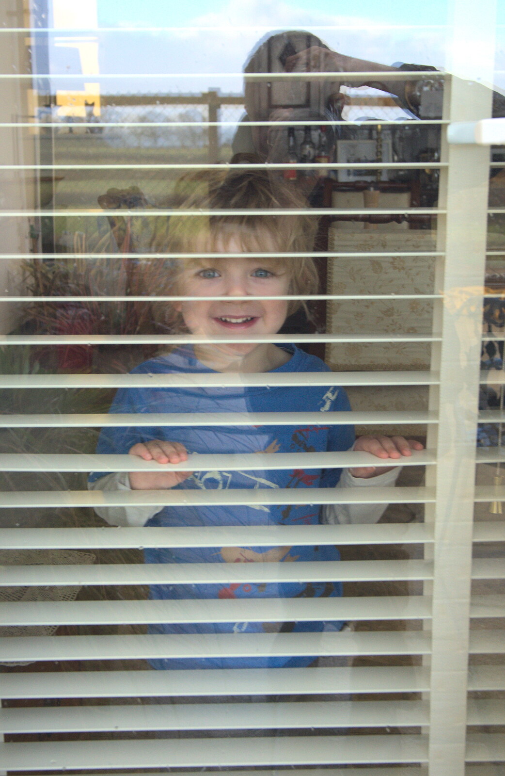 Fred looks out through a Venetian blind from The Boxing Day Hunt, Chagford, Devon - 26th December 2012