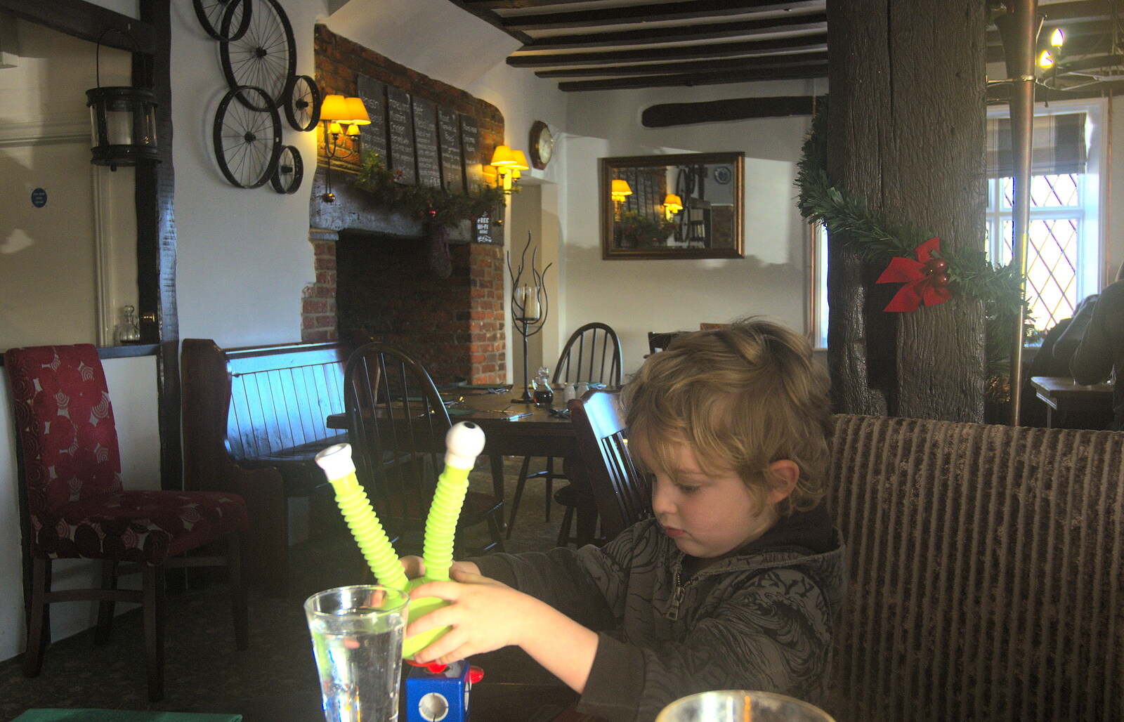 Fred plays with some sort of space toy from New Year's Day and Lunch at the White Horse, Ipswich, Finningham and Brome - 1st January 2013