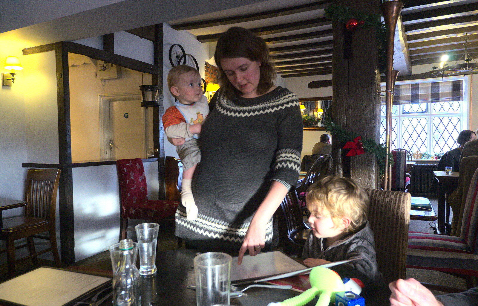 Isobel helps Fred read the menu from New Year's Day and Lunch at the White Horse, Ipswich, Finningham and Brome - 1st January 2013