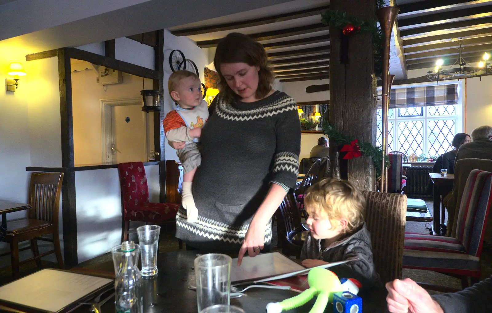 Isobel helps Fred read the menu, from New Year's Day and Lunch at the White Horse, Ipswich, Finningham and Brome - 1st January 2013