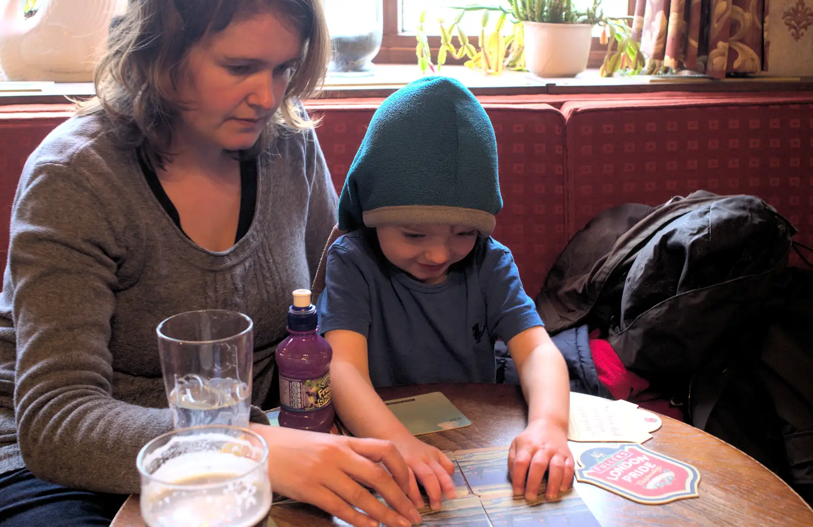 Fred assembles beer mats in the Swan, from New Year's Day and Lunch at the White Horse, Ipswich, Finningham and Brome - 1st January 2013